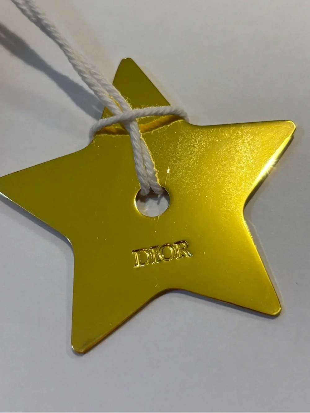 Dior Metallic Gold Star Tag with White Cord